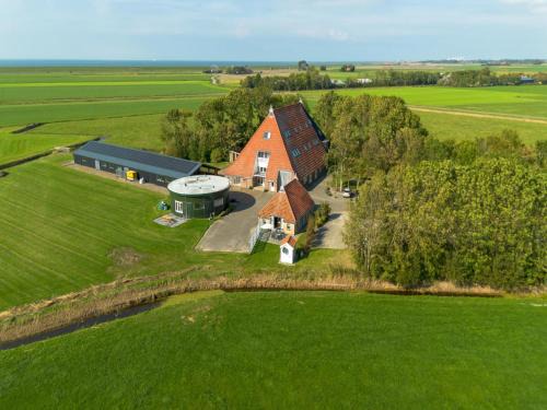 Pingjum House | Het Koetshuis