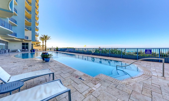 Panama City Beach Condo | High-rise beachfront condo with Gulf views, hot tub, pool & beach chair service