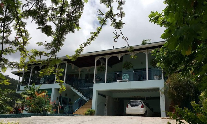 Port of Spain Apartment | Hillview Sanctuary | Birdsong Pool Wellness Sunset