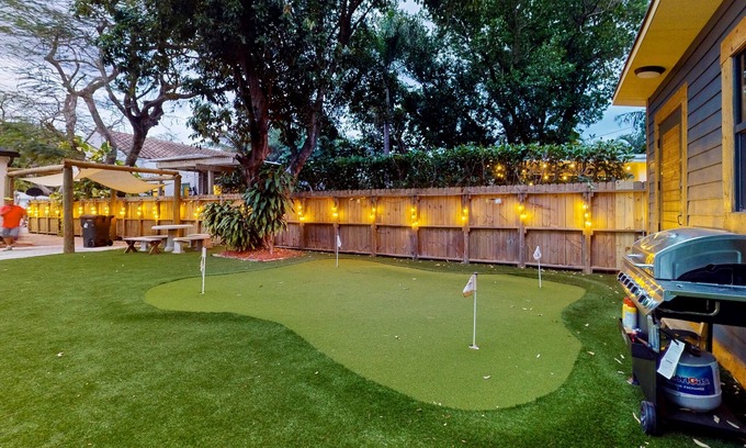 Poinciana Park House | Historic charmer with mini golf course, sauna, Ping-Pong, & wood fireplace