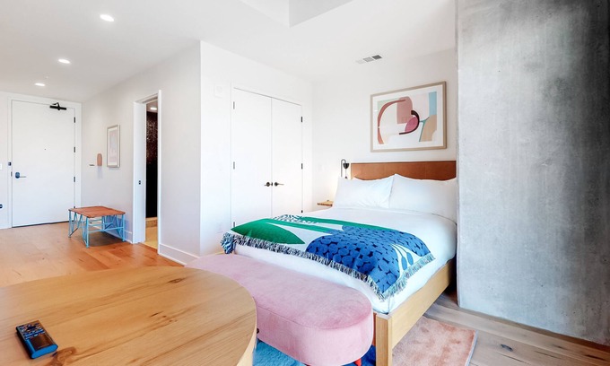 Rainey Street Historic District Apartment | Historic Rainey Street condo with city views, balcony, WiFi, and rooftop pool