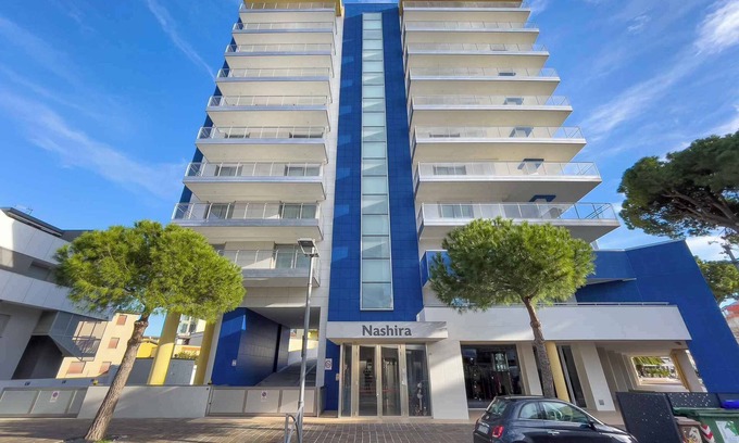 Lignano Sabbiadoro Apartment | Holiday apartment with balcony and air conditioning