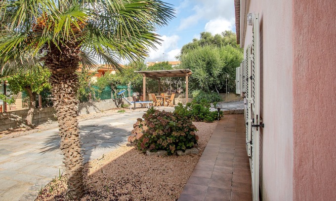 Paduledda Apartment | Holiday Apartment with Fireplace, Garden & Terrace; Parking Available