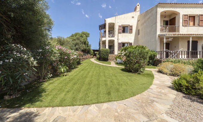 Stintino Apartment | Holiday Apartment "Stintino Sea Front Apartments A" with Sea View and Shared Garden