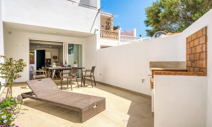 Cala Blanca Apartment | Holiday Home 'Els Arbocers 131-2' with Sea View, Garden & Wi-Fi