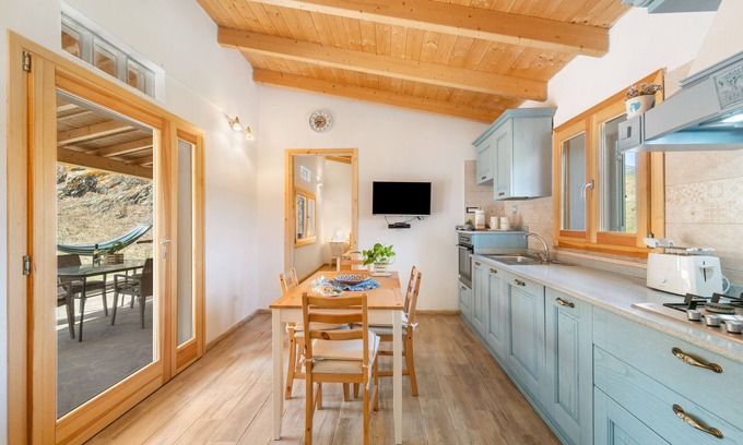 Buggerru House | Holiday Home 'Blanca' with Mountain View, Private Terrace and Air Conditioning