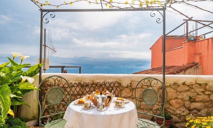 Baunei House | Holiday Home 'Casa Della Nonna Nel Borgo' with Mountain View, Private Garden and Wi-Fi