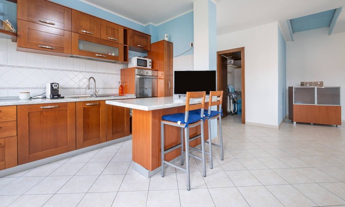 Sant'Antioco House | Holiday Home 'Casa Murru' with Balcony, Wi-Fi and Air Conditioning