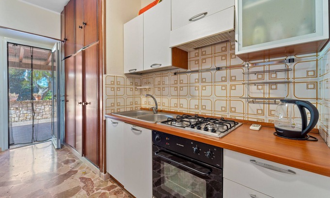 Portoscuso House | Holiday Home 'Casetta Angela' with BBQ, Shared Garden & Wi-Fi