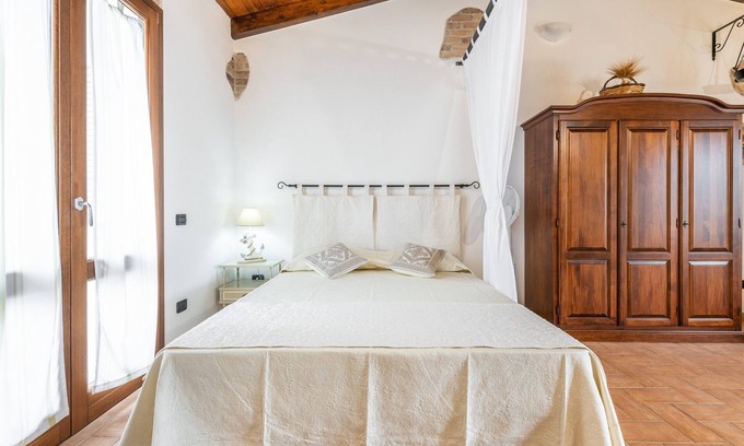 Sant'Antioco House | Holiday Home "Dependance Dei Ginepri" with Sea View, Terrace & Wi-Fi