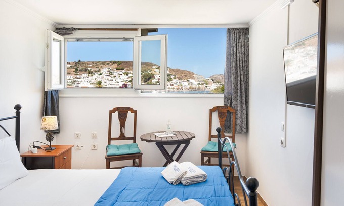 Skala House | Holiday Home 'El Greco Seaview Double 3rd Floor' with Sea View, Wi-Fi and Air Conditioning