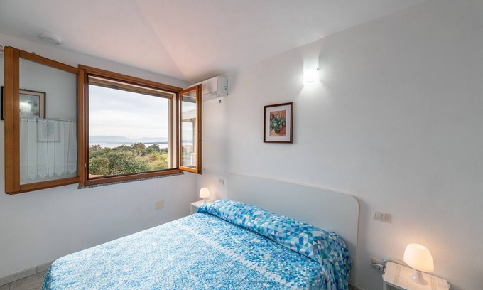 Calasetta House | Holiday Home 'Fra' with Sea View, Private Terrace and Air Conditioning