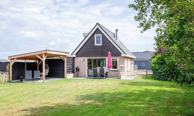 Den Burg House | Holiday home near dunes with wellness garden