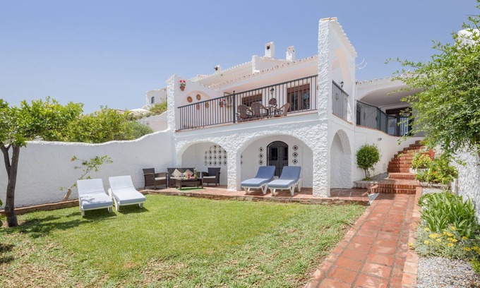 Nerja House | Holiday Home “Nerja Capistrano Villa” with Sea View, Wi-Fi, Garden, Terrace & Shared Pool