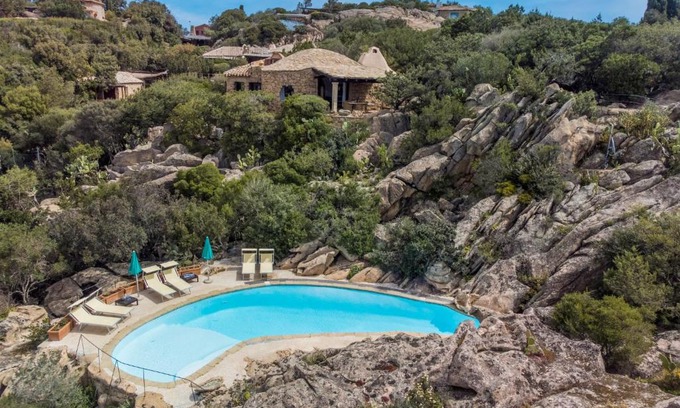 Capriccioli House | Holiday Home Roccia di Volpe by Interhome