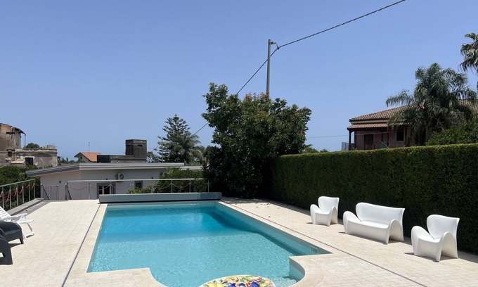 Carruba House | Holiday home "Tropical House" with private pool and near the sea