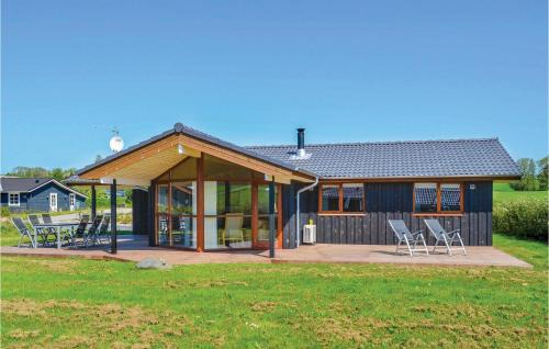 Ronde House | Holiday Home Valmuevej Rønde Ix