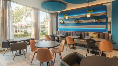 Am Riesenfeld Hotel | Holiday Inn - the niu, Brass Munich Olympiapark by IHG