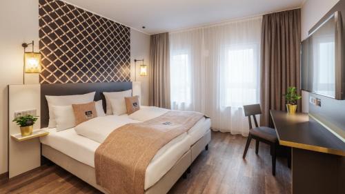 East Fasanenhof Hotel | Holiday Inn - the niu, Mesh Stuttgart Messe by IHG