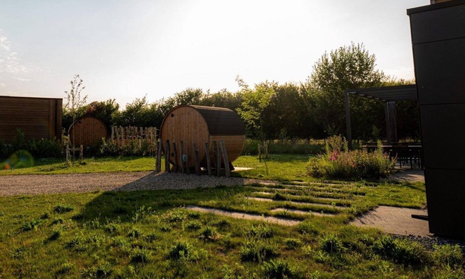 Kotten House | Holiday Villa Amalia 4 Deluxe is a 4-person holiday villa and features a private sauna. The home has two bedrooms and is situated on a generous and beautifully located plot surrounded by nature.