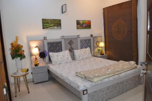 Karachi House | Holidazzle Residences DHA Karachi