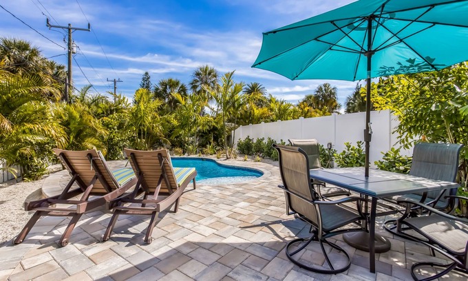 Holmes Beach Cottage | Home with Private Pool, Two Blocks from the Beach! - Queen Palms