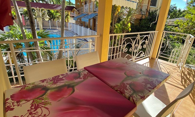 Baille-Argent Apartment | Homerez - Apt in Pointe-Noire w/pool