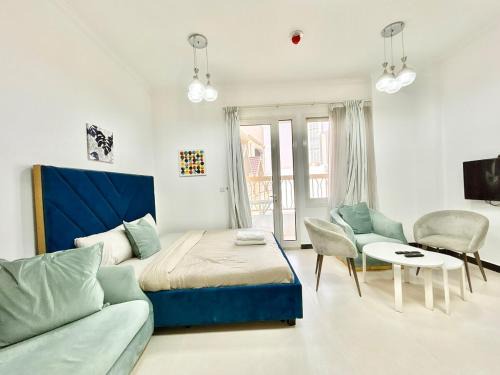 Jumeirah Village Triangle Apartment | Homes2Retreat - Modern Studio with Balcony in JVT