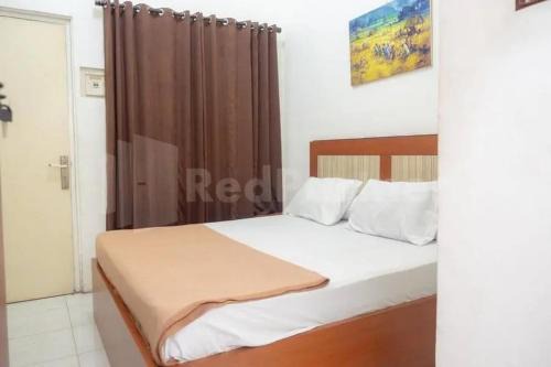 Surabaya House | Homestay Babussalam Rungkut Mitra RedDoorz