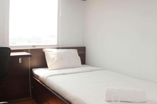 Bekasi Apartment | Homey and Minimalist 2BR at Patraland Urbano Apartment By Travelio