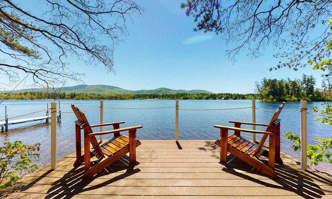 The Bays House | Homey lakeside property w/one house, two cottages, mtn. views, & private beach