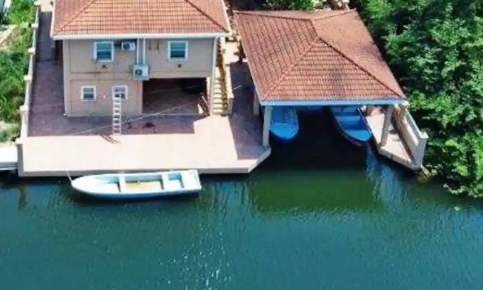 Sittee River House | Hopkins Beach Retreat - Canal House, swim in ocean, kayak the river, ride bikes
