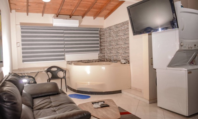 Castropol Apartment | Hot tub, AC 1 bedroom Calle 8 3 blocks from Lleras. Apt 303
