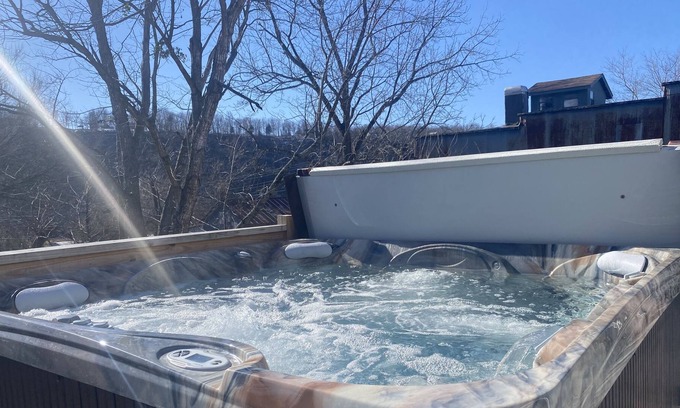 Cotter Apartment | HOT TUB!! Beautifully renovated property with large private HOT TUB!!