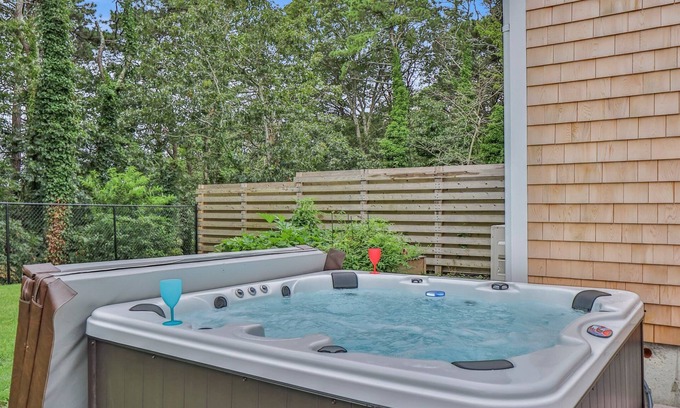 Eastham Condo | Hot Tub - King Bed - Fireplace and Firepit - walk to Pond