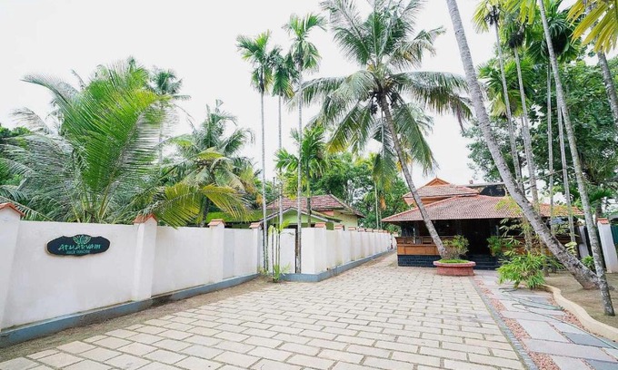 North Paravur Hotel | Hotel O ATHARVAM RESORT
