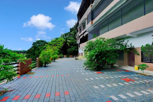 Malappuram Hotel | Hotel O Naval Tower