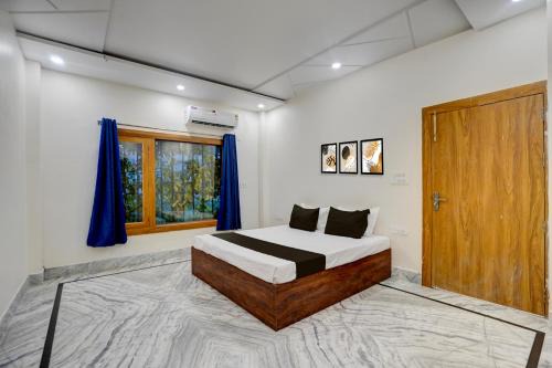 Jhusi Hotel | Hotel O Pristine inn