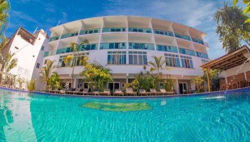 Rincon de Guayabitos Hotel | Hotel Rega Suites Guayabitos - Family & Kitchen