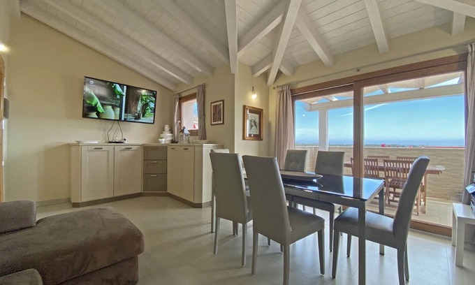 Budoni Apartment | House 41 - penthouse in the historic center crazy sea view - all services nearby