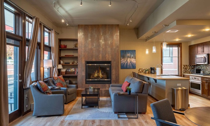 Downtown Steamboat Springs Condo | Howelsen Place A302 | Air Conditioning | Private Parking Garage | Fire Pit with Views