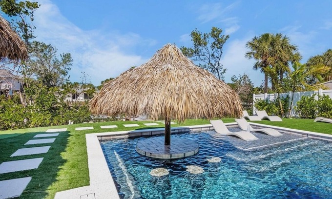 Anna Maria House | Huge Fall Discounts! New Breathtaking Canal front Home on Best street in AMI!