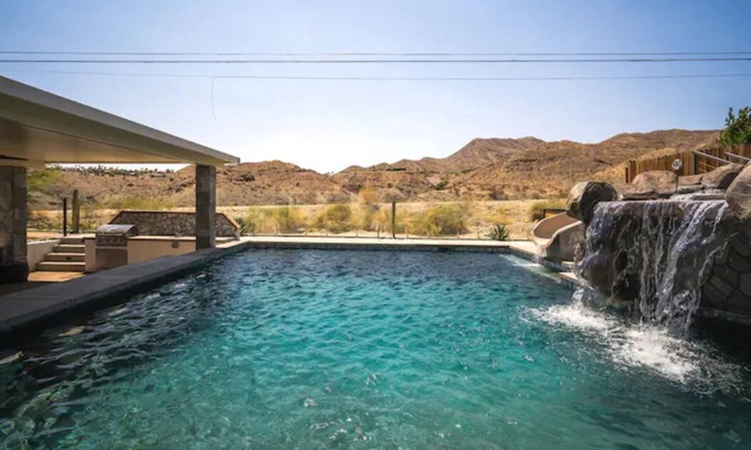 Cathedral City Cove House | Huge Home: Pool, Grotto, Water Slide, Swim Up Bar, Hot Tub, Fire Pit, Game Room