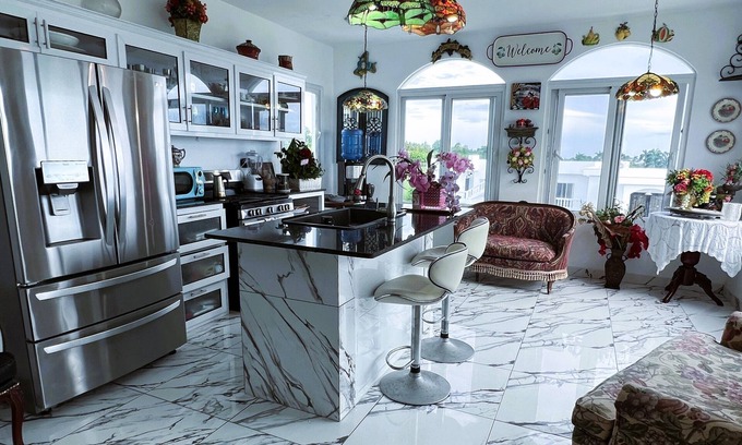 Cabrera Apartment | Huge penthouse suite w/kitchen, sunroom, & soaking tub on a private balcony!