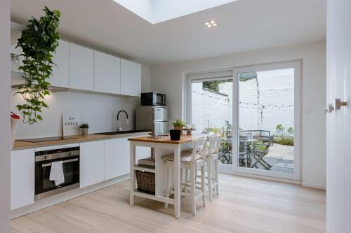 Rooigem House | Huswell - Charming townhouse in Ghent perfect for 6 Guests