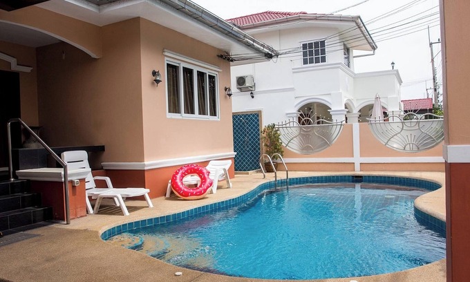 Na Kluea Villa | I-Rin poolvilla featuring its own swimming pool set in a private estate.