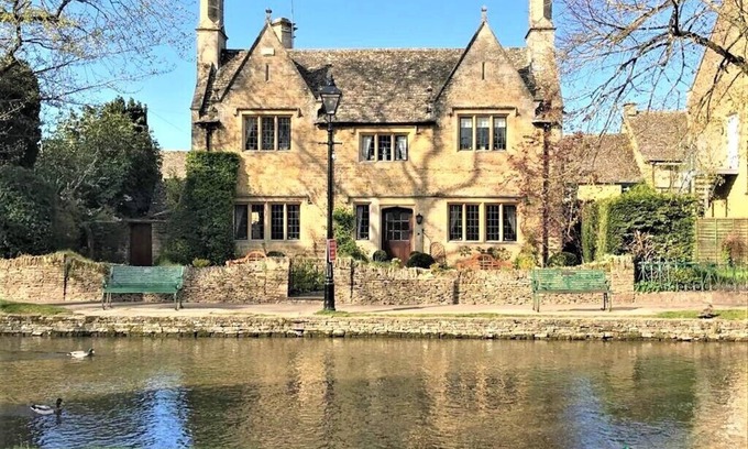 Bourton House | Iconic Luxury Detached Period House on the River Bank with parking.