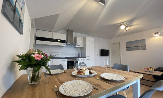 Motzach Apartment | Idyllic apartment in the countryside with south-facing balcony, parking space (wallbox) and bicycle room.