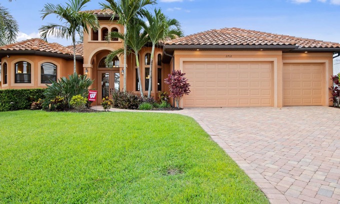 Pelican House | III Palms Oasis - 4/3 Electric Heated Pool & Spa with Gulf Access, Tiki Hut and Boat Dock