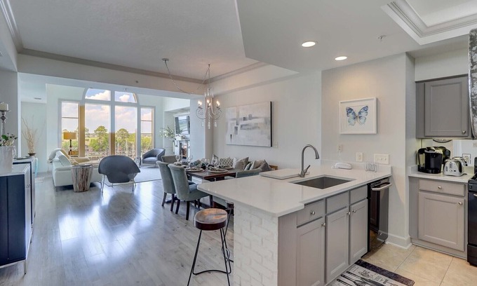 Shelter Cove Villa | Immaculately updated harbor view penthouse condo near beach!
